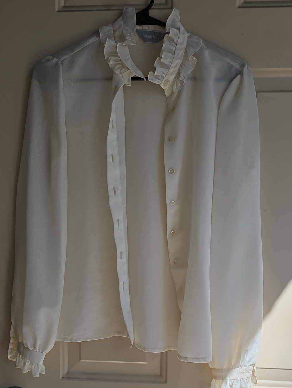 Ruffled Ivory Tie-Neck Blouse